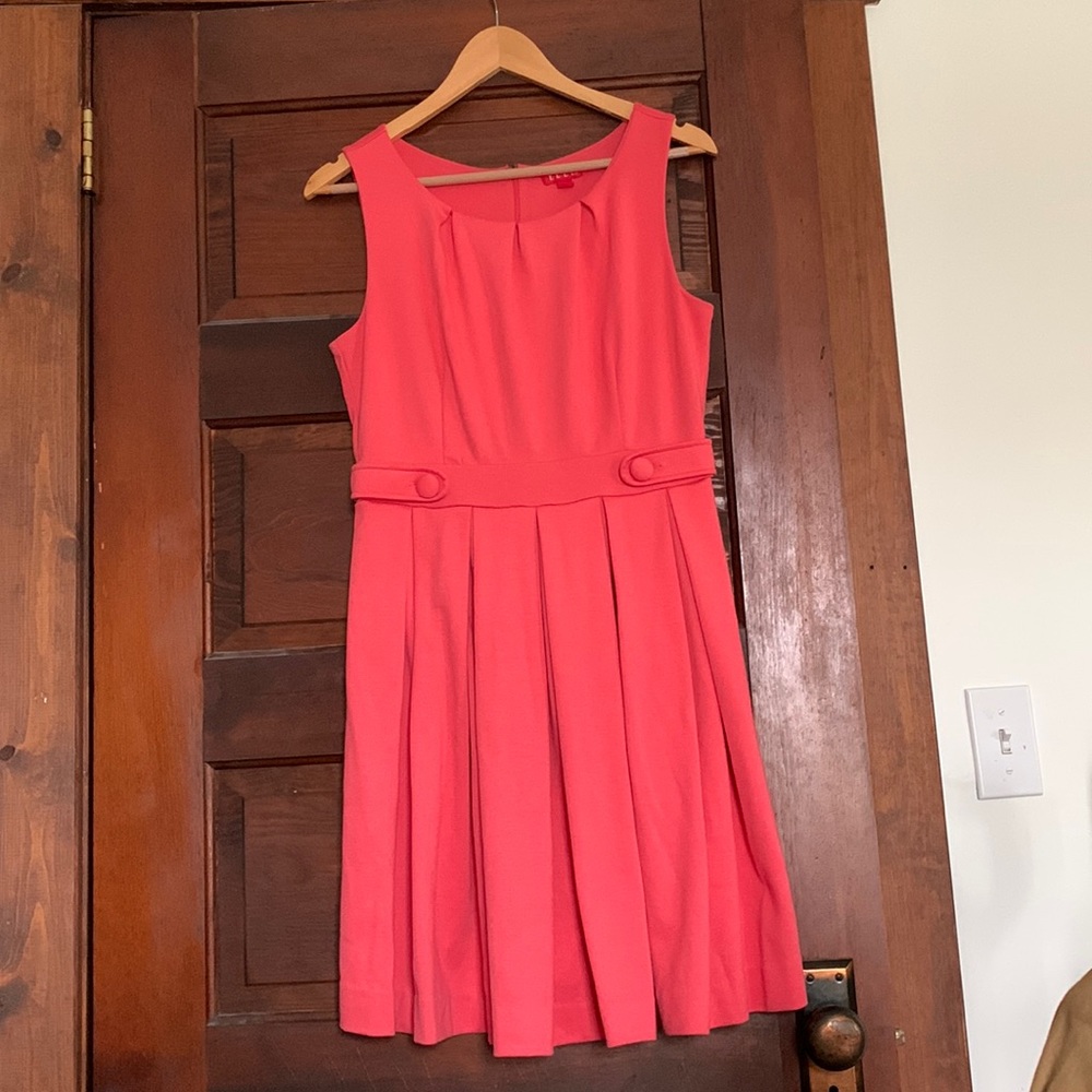 Coral pleated knee length dress